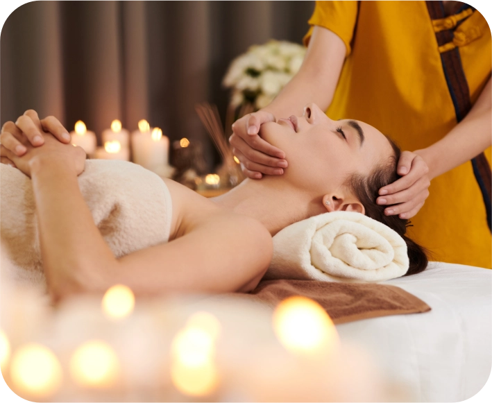 Massage near you. Women getting a relaxing massage in a candlelit rooom